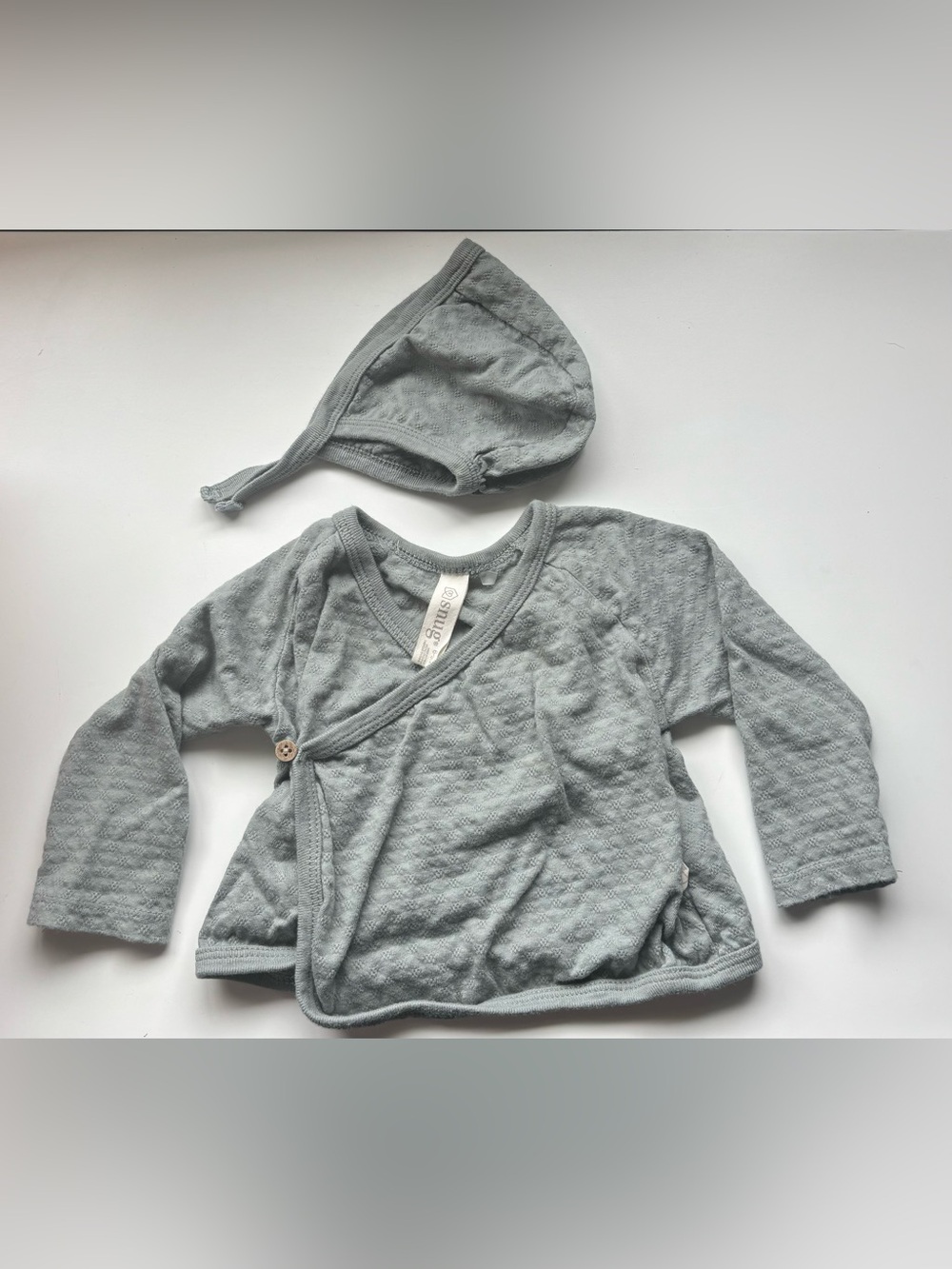 Snug baby grey/green pointelle knit kimono top with a matching bonnet